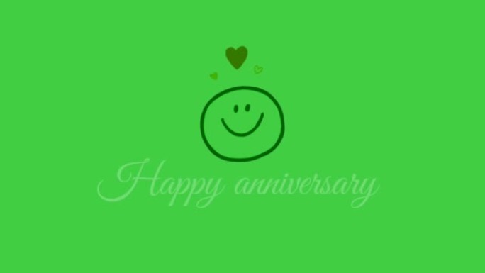 在绿色屏幕背景上带有笑脸和红心的 “周年纪念日” 动画