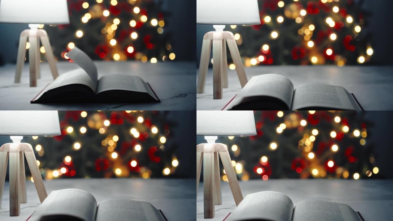 圣诞节在夜房的桌子上打开书