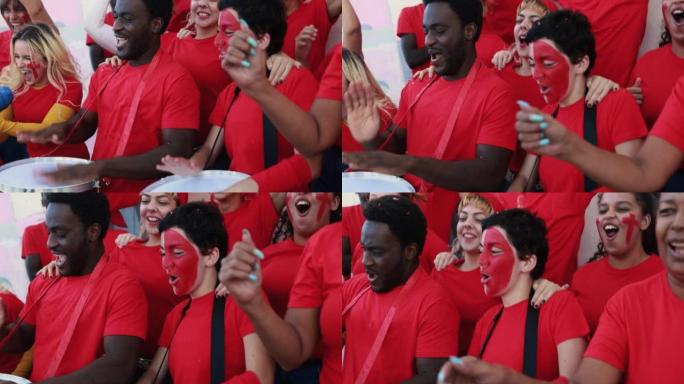 多种族的红色运动迷在支持他们的球队时尖叫-足球支持者在比赛中玩耍-冠军和获胜概念