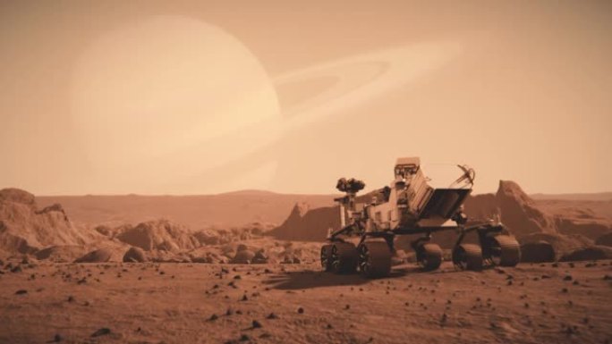 美国国家航空航天局的火星探测车穿越火星表面向土星行驶的镜头