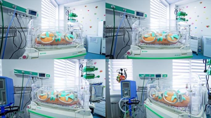 新生婴儿的现代孵化器。特写。现代妇产医院复苏可爱的光室。