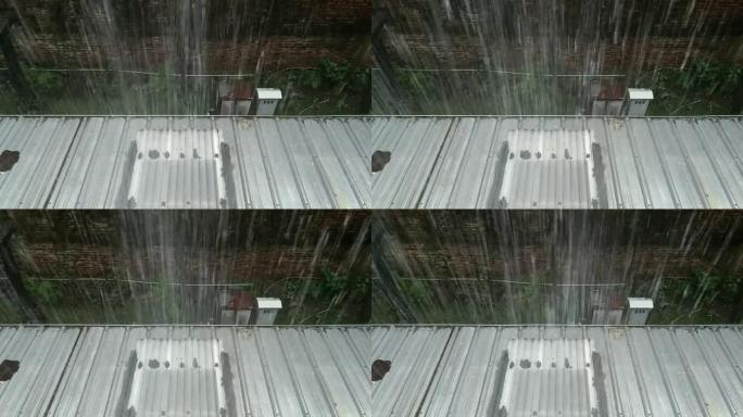 雨水落在石棉屋顶上