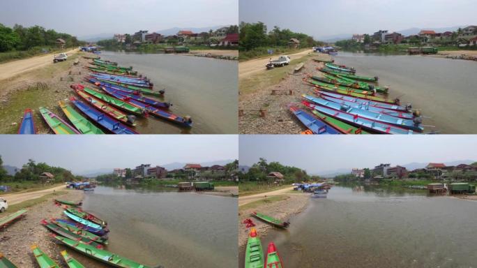 老挝万旺南松河岸边彩船的鸟瞰图