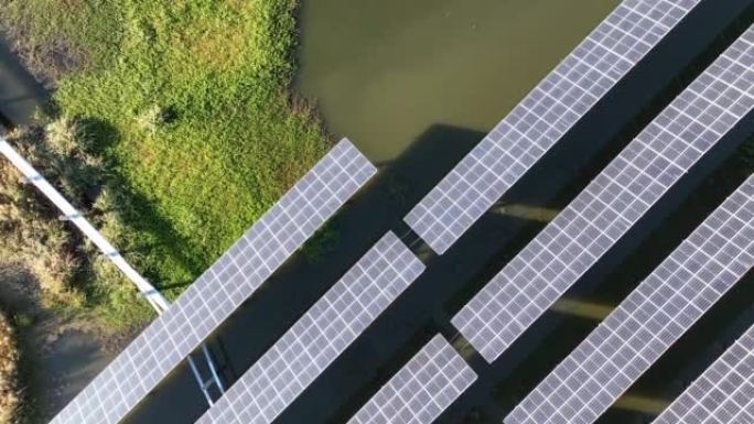 4K-实时: 鱼场太阳能发电站的无人机视图