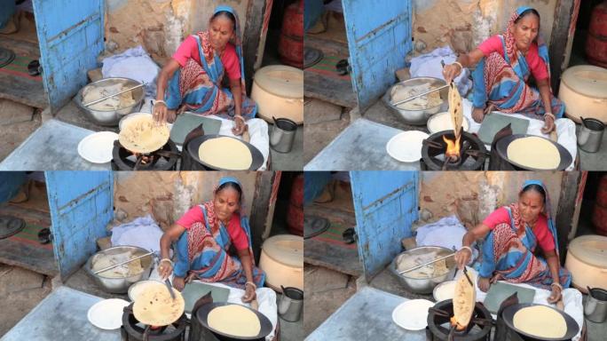 印度街头小贩准备食物 -- 查帕蒂，扁平面包