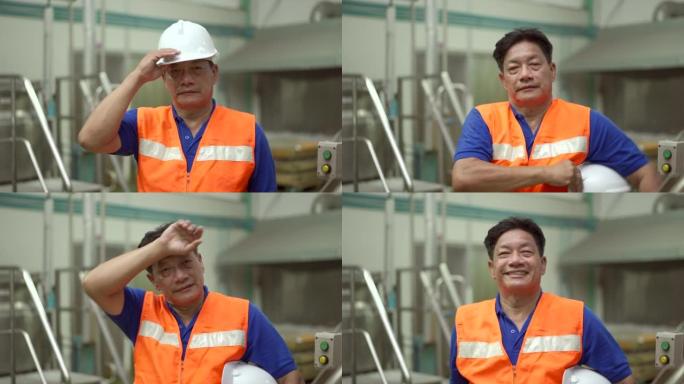 亚洲蓝领工人戴头盔。