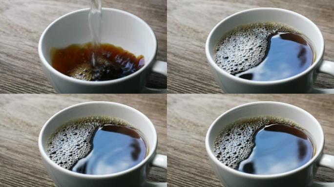 近距离拿一勺咖啡，然后将热水倒入白色陶瓷杯中。