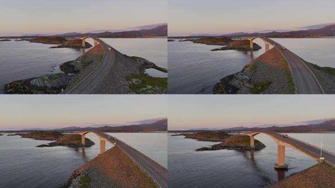 日落时挪威大西洋路的鸟瞰图