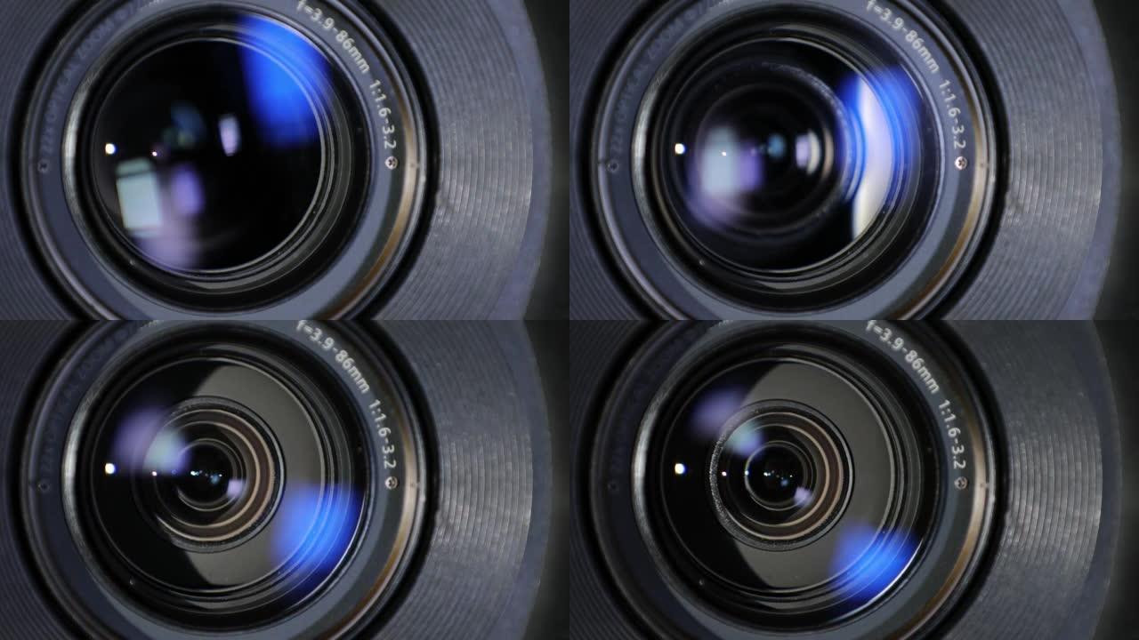 光学玻璃上有光斑的相机镜头特写。相机镜头的变焦过程