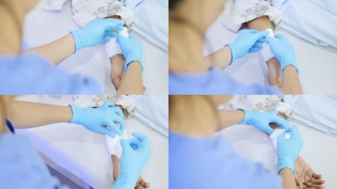 亚洲女医生为患者进行手臂关节物理治疗