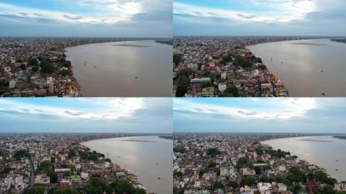 印度北方邦Banaras瓦拉纳西市与恒河、高止山脉、瓦拉纳西的房屋的航拍视频4k