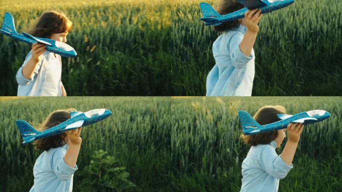 快乐的男孩在晴天扔纸飞机在田野里奔跑。儿童游戏，幻想和梦想。