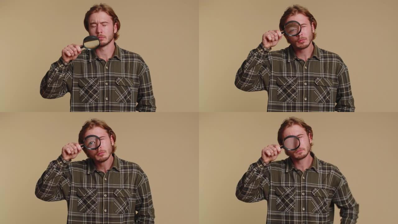 研究员研究员男子用放大镜靠近脸部，用大变焦眼睛看着相机