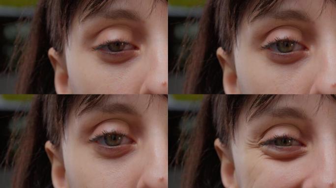 镜头前的一只绿眼睛和半脸的微距拍摄