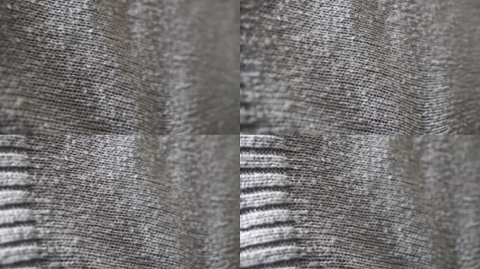 针织灰色亚克力围巾纺织品抽象背景。