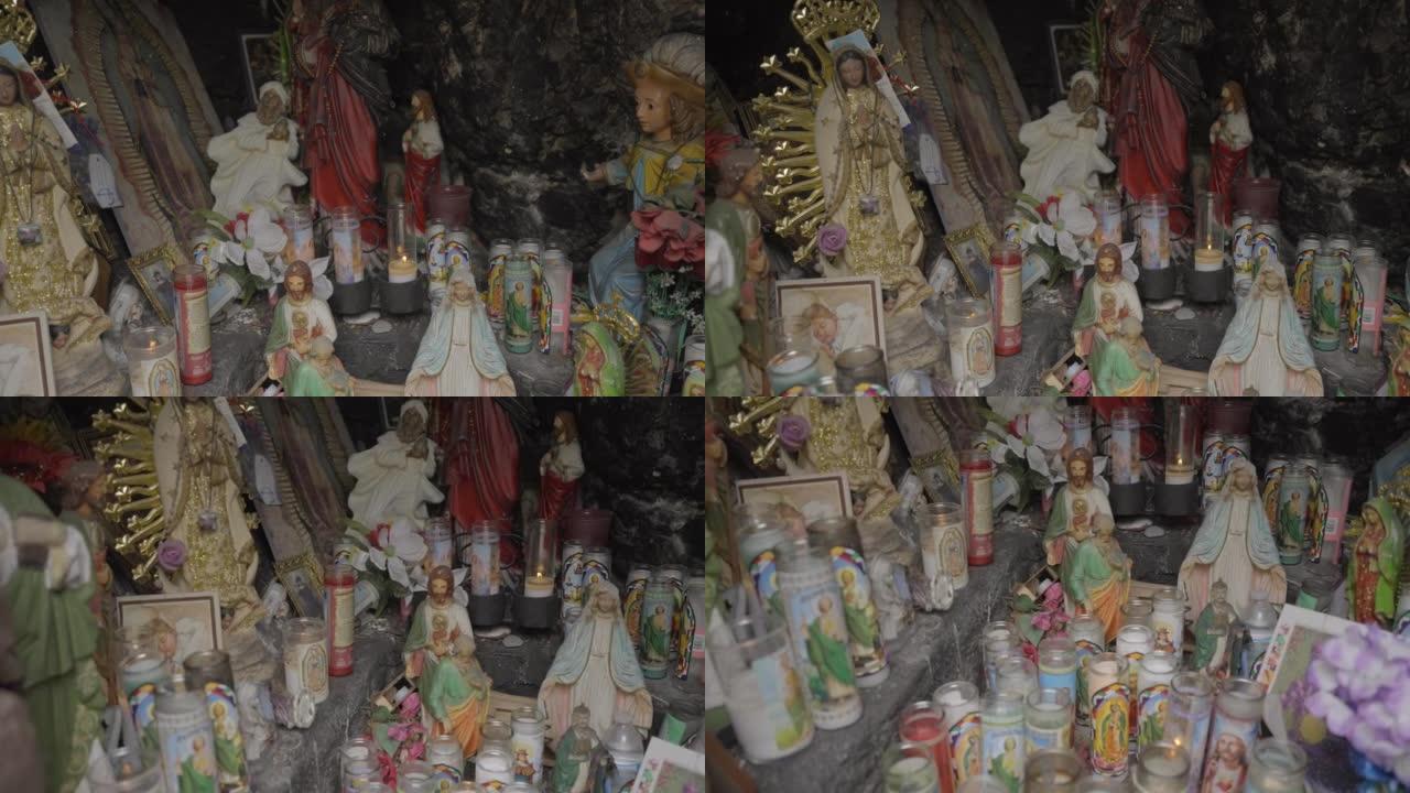 石窟内的天主教雕像和蜡烛