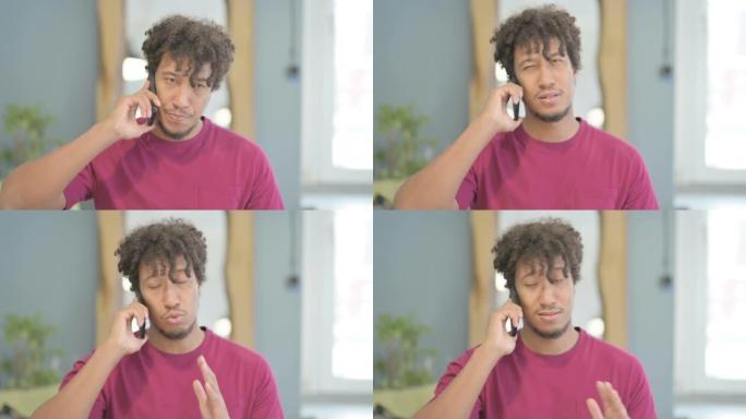 非洲男子在电话中讨论工作