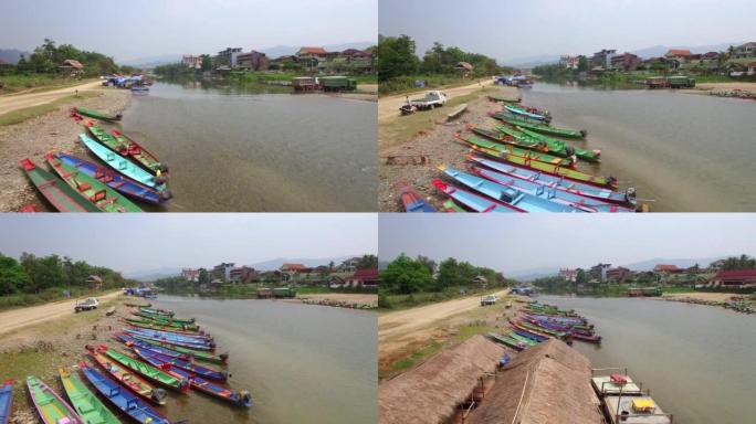 老挝万旺南松河岸边彩船的鸟瞰图