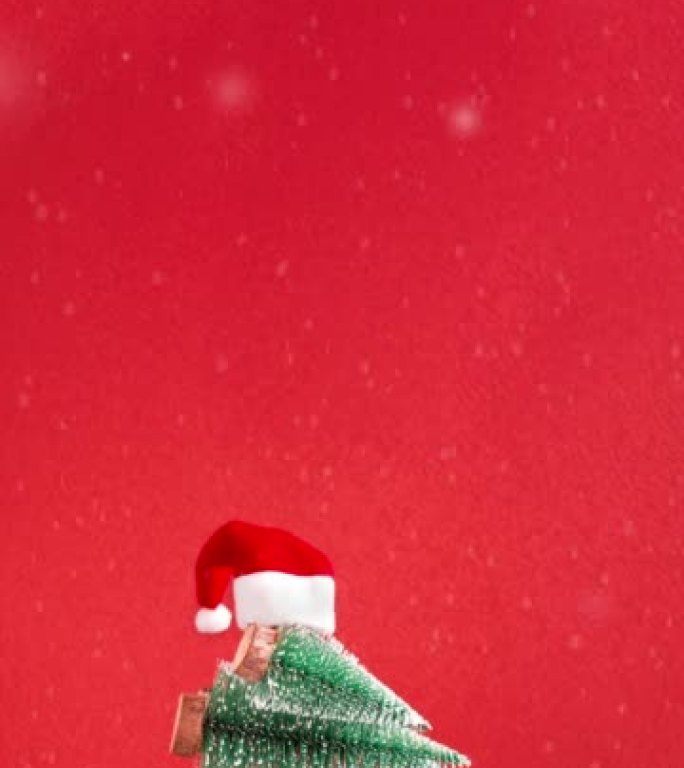 圣诞快乐，新年快乐，红色背景上有卡车送货松树和圣诞老人帽子