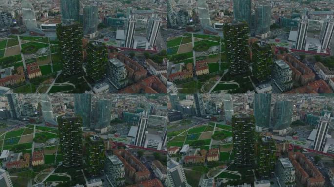 现代高层公寓楼覆盖花园，TreeVilla公园。空中滑梯和平移镜头。