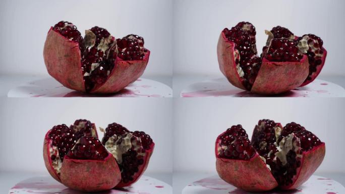 鲜红的新鲜石榴。旋转红色成熟石榴。高质量4k镜头