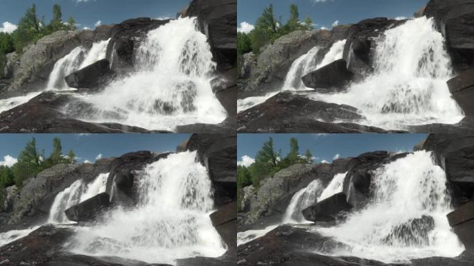 公园里岩石瀑布的飞溅水