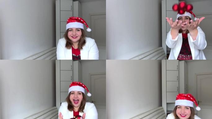 一名戴着新年帽、身穿白色夹克的成年女子将红色气球抛在头上。她在一间白色的房间里。女人抛出了一个礼物，