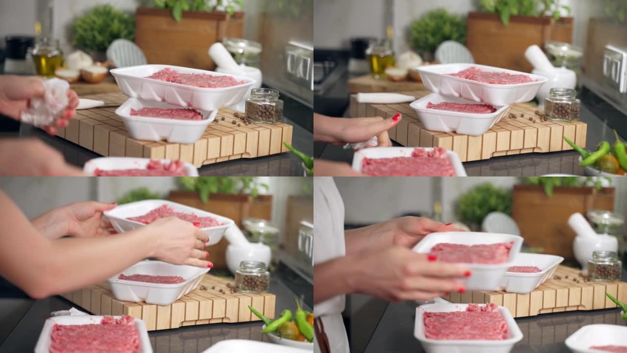 时髦的红色修指甲的女人打开带有牛肉末的白色塑料容器，在厨房工作场所准备制作多汁的家庭汉堡。专业木板上