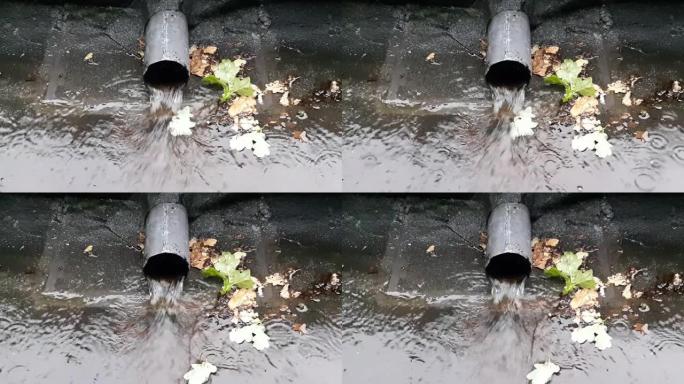 从排水管流出的水的特写镜头