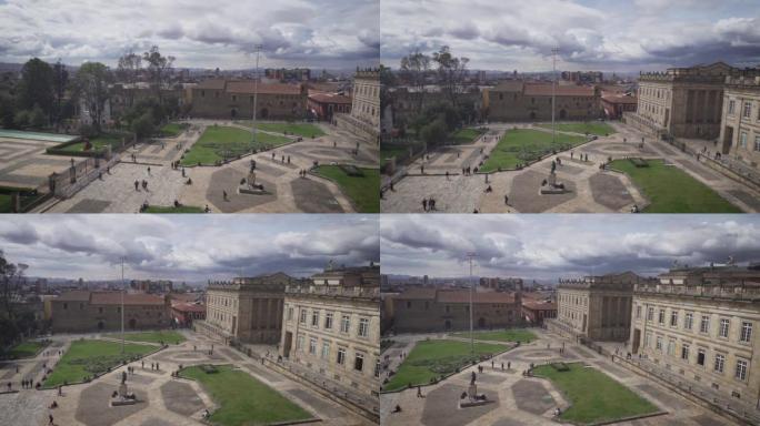 哥伦比亚共和国国会的景色，背景云，建筑广场和绿色公园