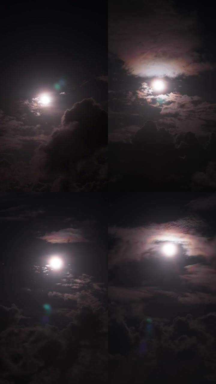 时间流逝，暴露月亮在夜空中移动，乌云密布。