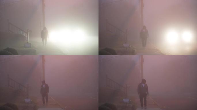 神秘男子在雾蒙蒙的早晨走在街上