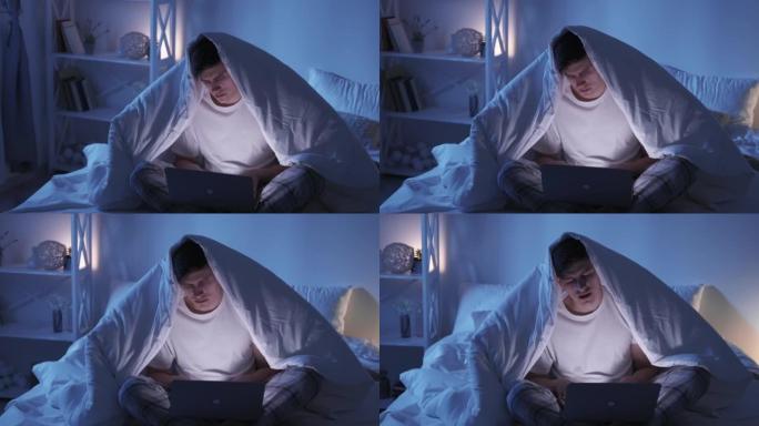 床夜工作互联网乏力疲惫的男人笔记本电脑