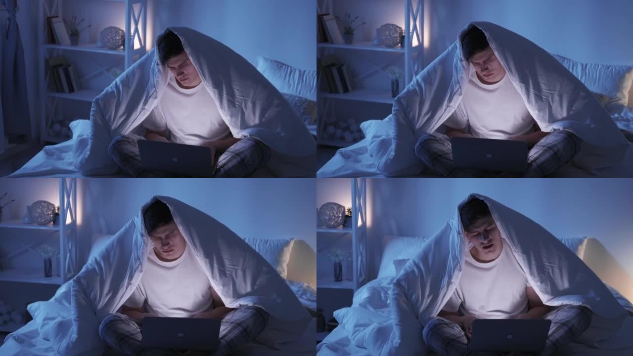 床夜工作互联网乏力疲惫的男人笔记本电脑