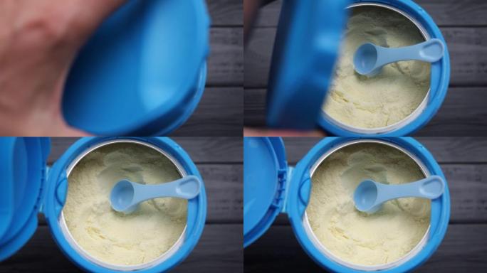 婴儿食品装在罐子里。儿童罐子里的黄色粉末。