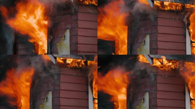 当消防员为拯救房屋结构而战时，火焰呼啸而过并蔓延时，关闭了建筑物火灾的POV。