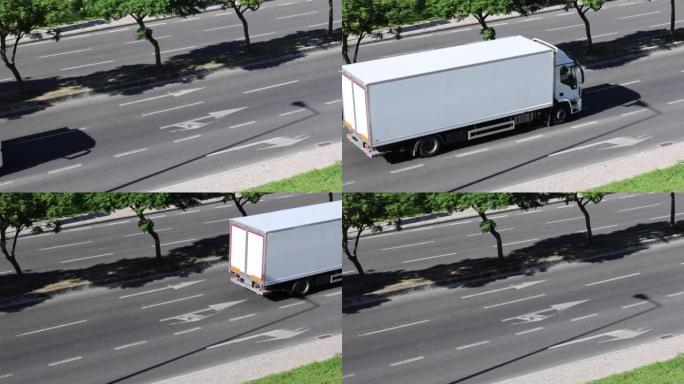 用汽车和白色货车隔开的树木分隔的平静双向交通的Arial视频