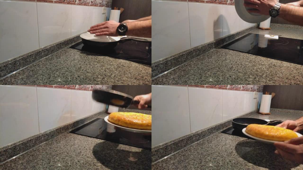 将西班牙玉米饼从平底锅转到盘子，准备食用