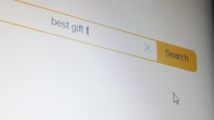 屏幕上搜索引擎行的特写镜头，有人输入查询圣诞节最佳礼物