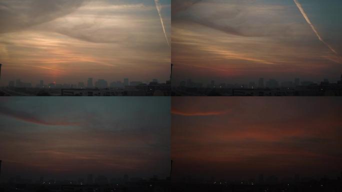 迪拜市郊区日落的时光倒流，橙色的天空中几乎没有云