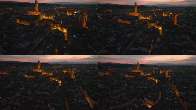 高角度视图照亮了老城区的广场和街道。向上倾斜显示黄昏时的著名景点和彩色天空。意大利佛罗伦萨