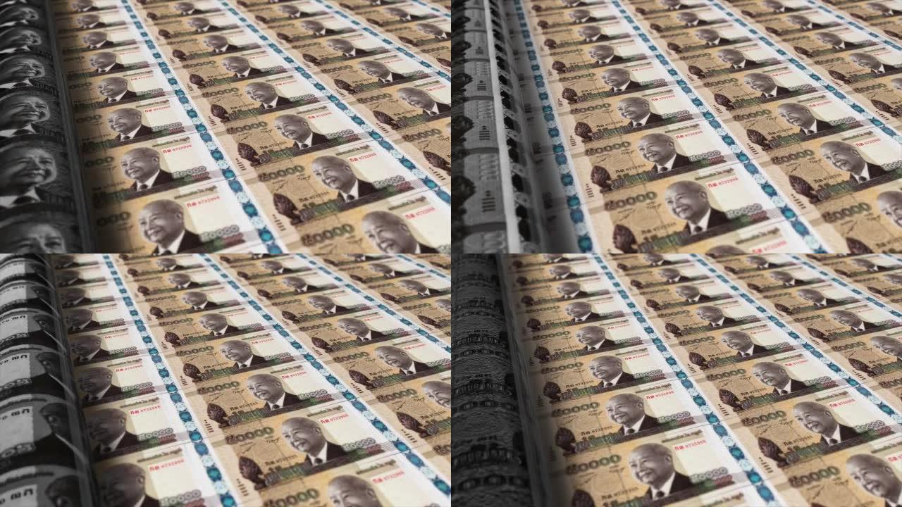 柬埔寨，柬埔寨瑞尔印刷机打印出当前50000瑞尔钞票，无缝循环，柬埔寨货币背景，4K，聚焦深度Smo