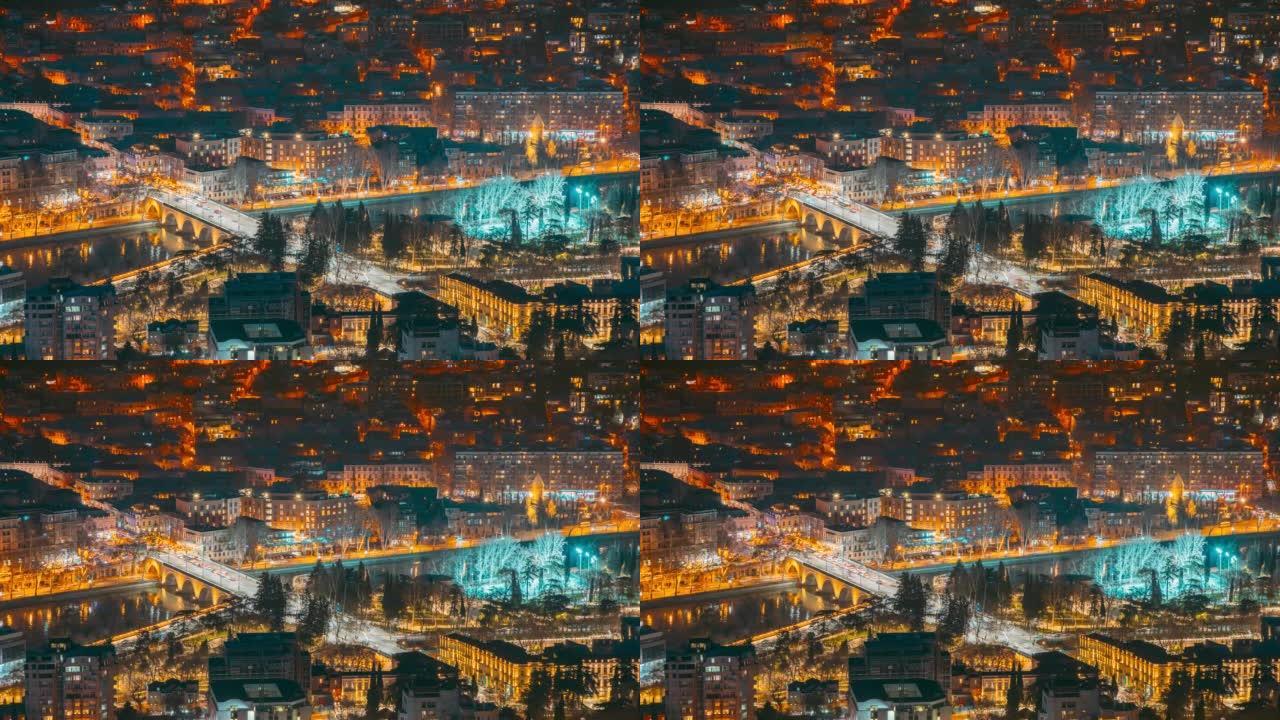 格鲁吉亚第比利斯。市中心的夜景。4k延时格鲁吉亚首都天际线城市景观夜间延时延时。蓝色小时夜间照明灯。