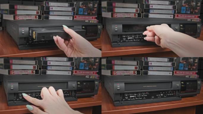 将VHS盒式磁带插入VCR并按播放按钮