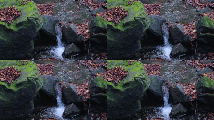 瀑布，美丽的水在岩石之间流动