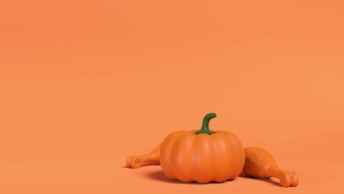 火鸡或带南瓜的鸡腿在橙色背景下以4k分辨率表示感恩节
