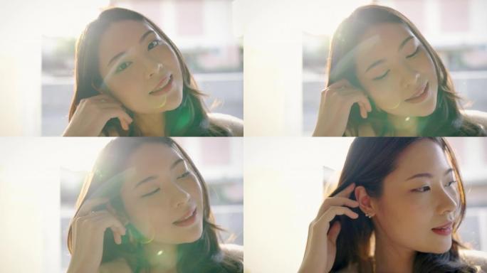 肖像微笑快乐美丽天真的亚洲女人放松阳光耀斑。亚洲女孩脸在白衬衫上美容长发水疗女人治疗完美透明美容皮肤