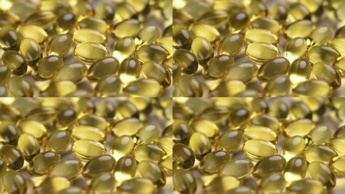 黄色软胶囊Omega-3。鱼油半透明药丸。天然补充剂