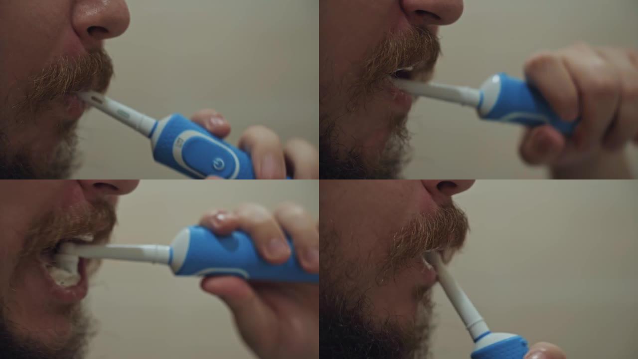 男人用电动牙刷刷牙。