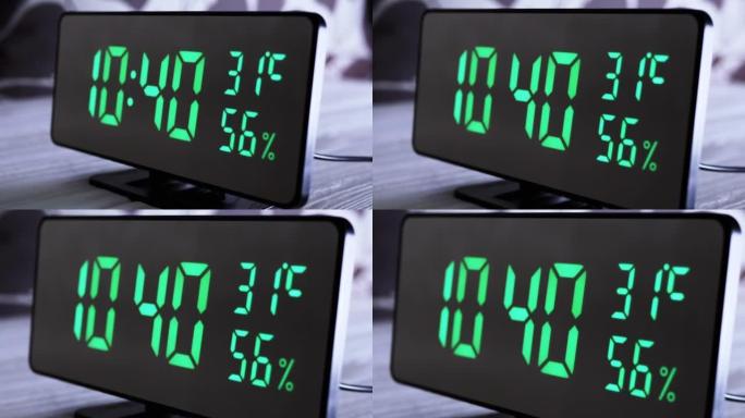 数字时钟在绿色显示上午10:40上显示时间、温度、空气湿度